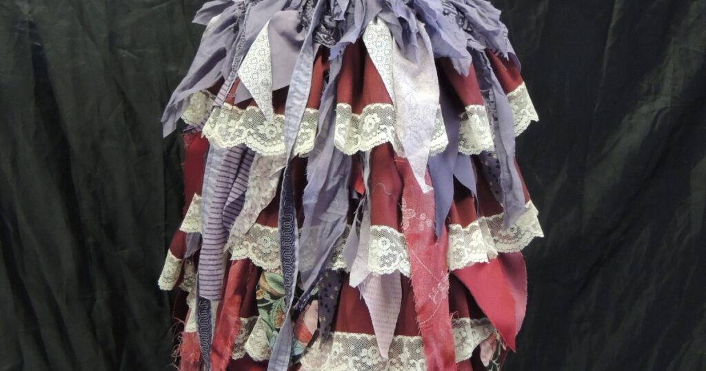 Closeup view of fairydress with freestyle fringe showing colour changes in the fringe layers
