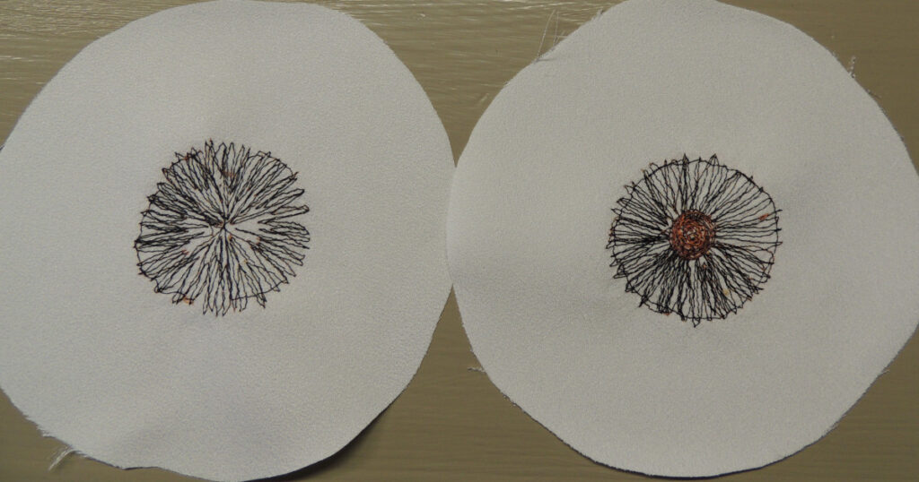The backs of two eyeball pieces showing the stitching that holds the iris fabric in place.  The eye on the left only has the iris stitching done.  The eye on the right has the iris stitching and the pupil stitching done.