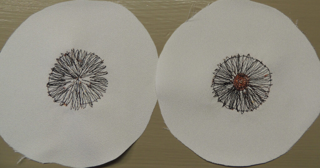 The backs of two eyeball pieces showing the stitching that holds the iris fabric in place. The eye on the left only has the iris stitching done. The eye on the right has the iris stitching and the pupil stitching done.