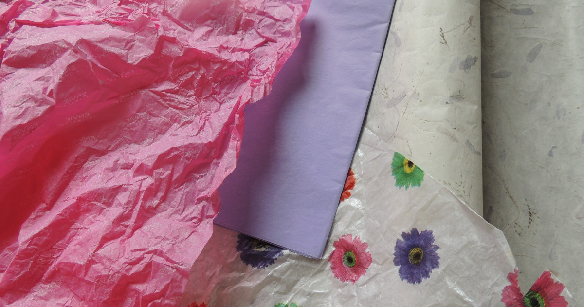A selection of papers that would work to make your own wallpaper.  These include gift-wrapping tissue paper either new or used, and handmade paper with fried flowers embedded in it