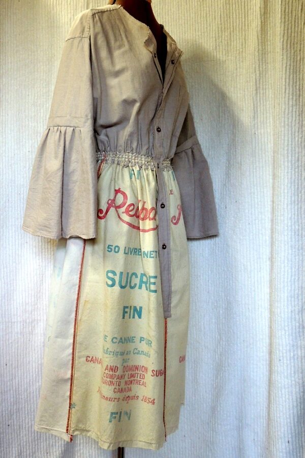 Partial front view of dress made from sugar bags and a man's shirt