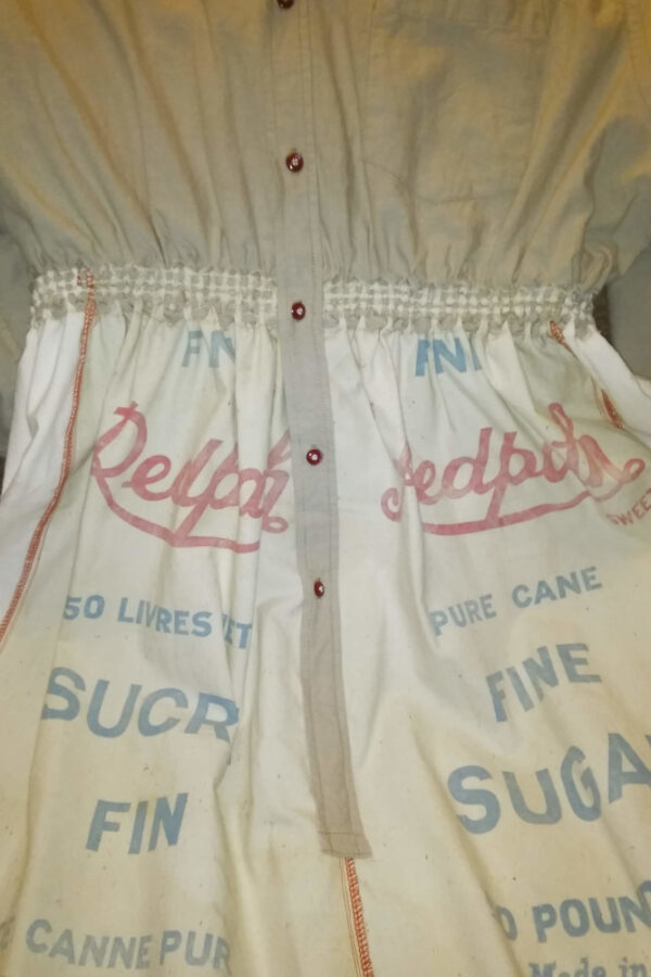 Close-up view of Redpath sugar bags at front of dress