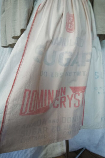 Close-up view of Dominion sugar bag at back of dress