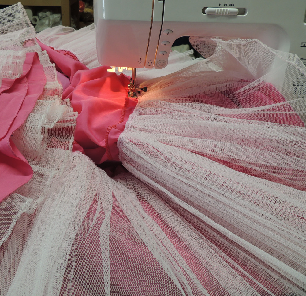 Sewing crinoline layer onto cape lining