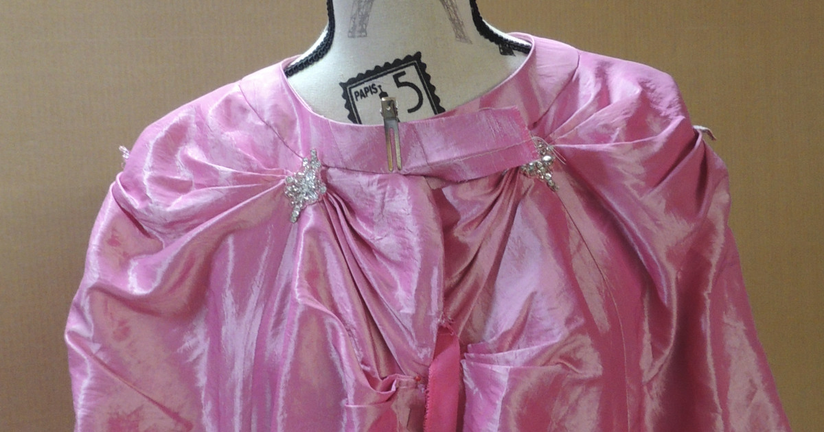 Pink cape with yoke sewn on
